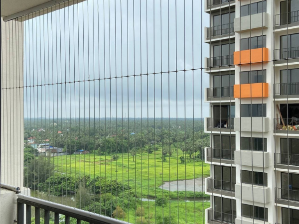 Mahadev Invisible Grill Service installing invisible grills